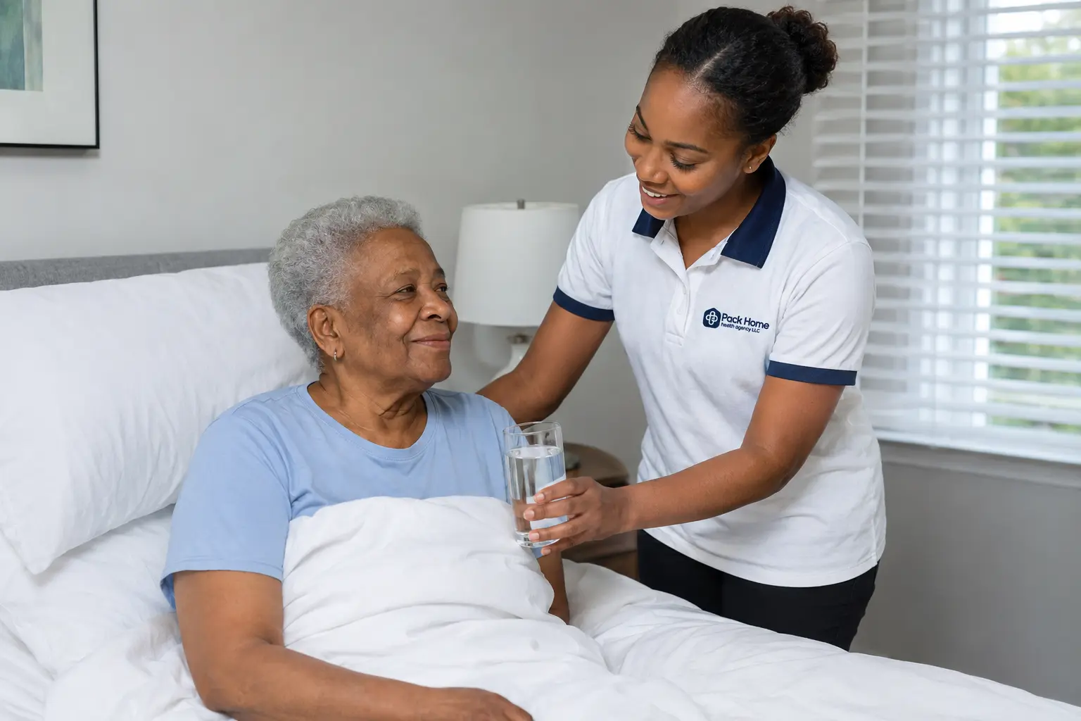 Caregivers assisting elderly couple